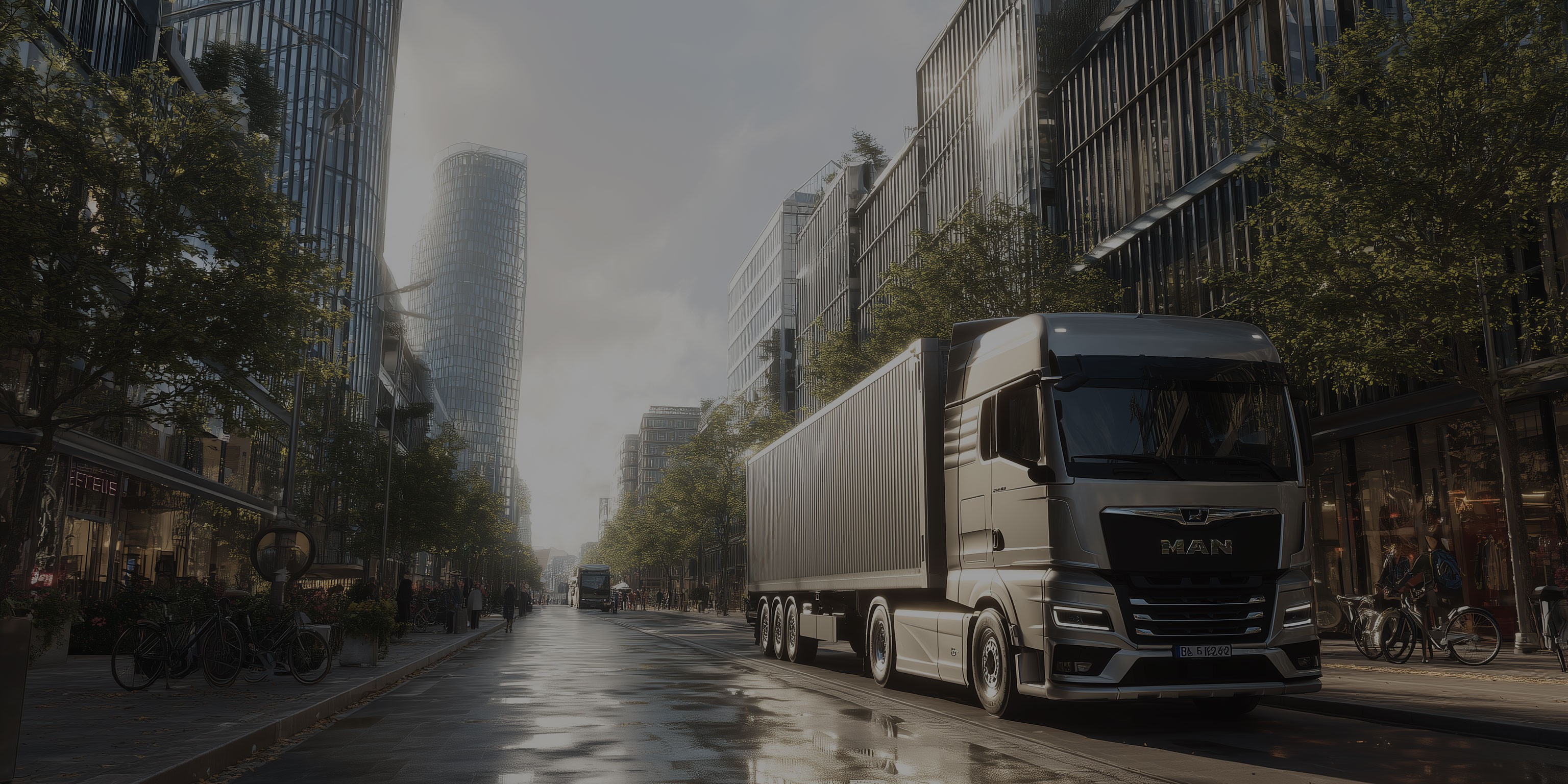 Ein LKW fährt auf einer nassen Straße durch eine Stadt