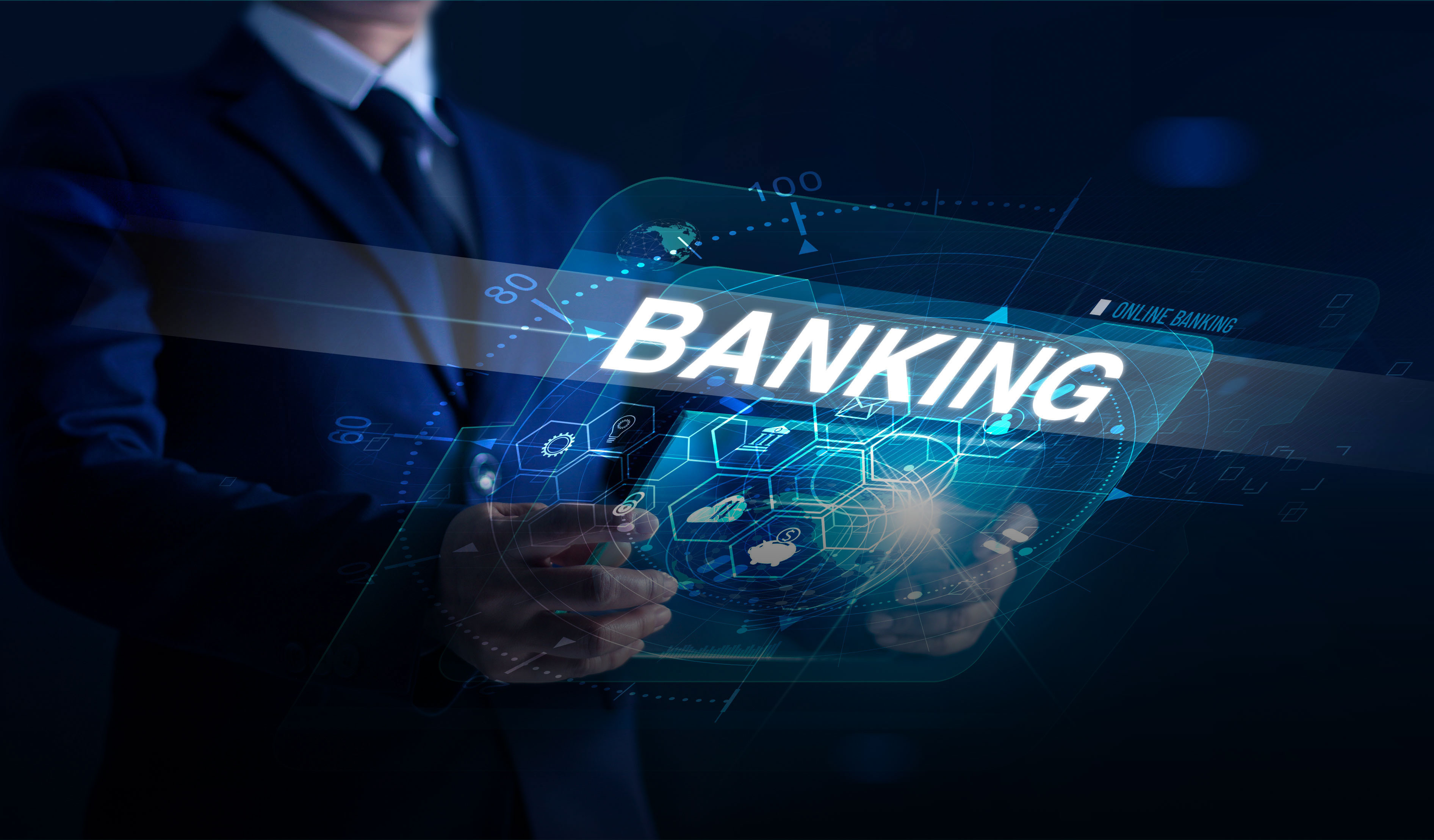 Hände die ein Bildschirm Hologramm halten mit dem Schriftzug Banking